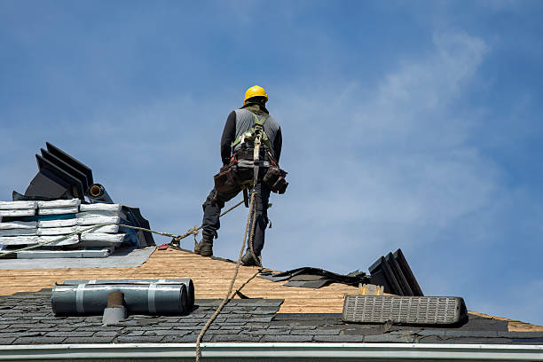 Professional Roof Replacement technician working in Matthews, IN